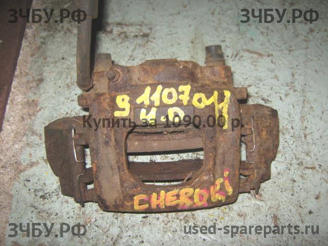 Jeep Cherokee 3 Суппорт передний правый (в сборе со скобой)