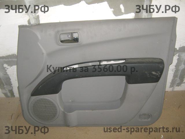 Mitsubishi L200 (4)[KB] Обшивка двери передней правой