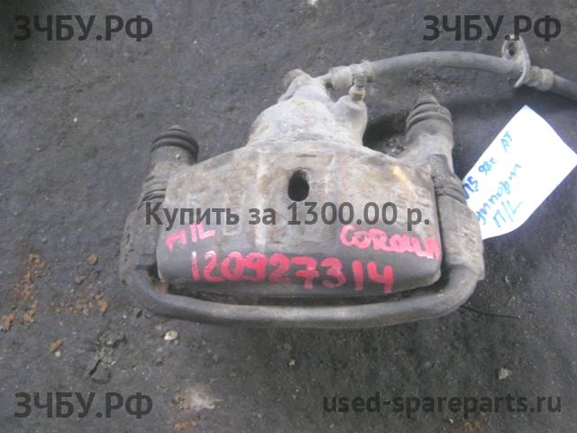 Toyota Corolla (E11) Суппорт передний левый (в сборе со скобой)