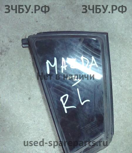 Mazda 3 [BK] Стекло двери задней левой (форточка)