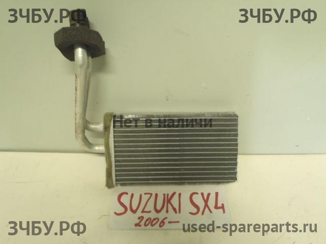 Suzuki SX4 (1) Радиатор отопителя